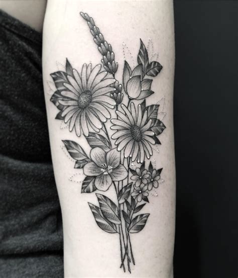 flower tattoo designs cover up|delicate flower bouquet tattoo.